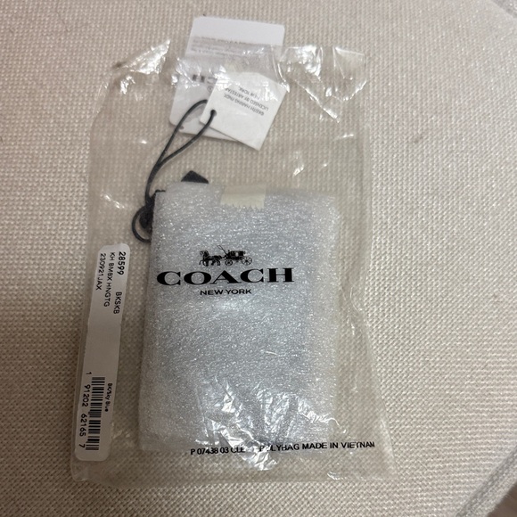 Coach Accessories - NWT, Coach vintage Keith Haring metallic key chain in denim blue .